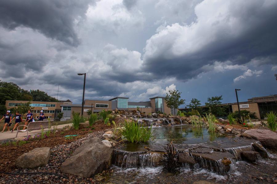 Storm clouds roll in over the University Center.